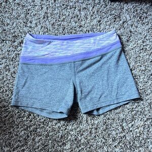 Mid/low waisted purple and grey athletic mini spanks/shorts